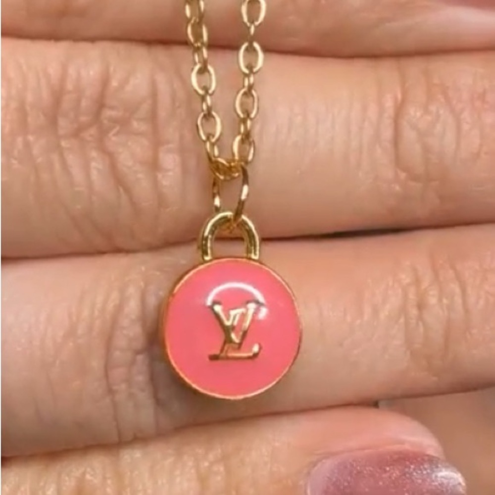 Authentic Louis Vuitton zipper pull charm